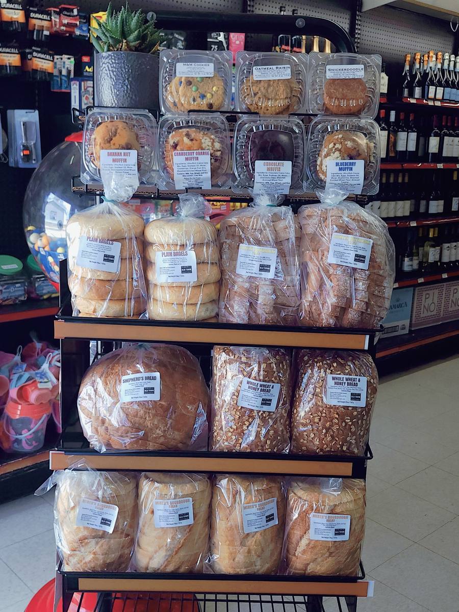 Fresh bread and pastries on the bakery rack