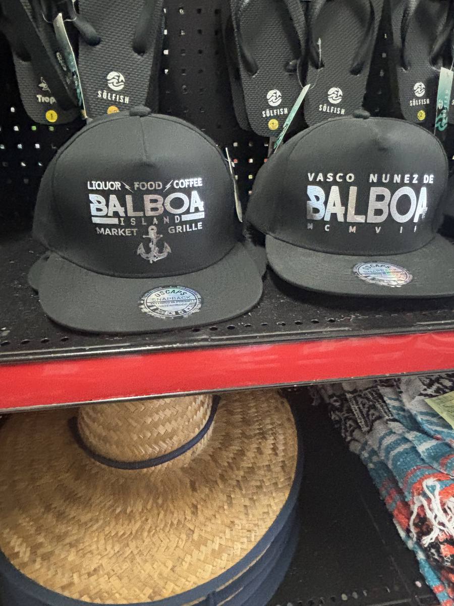 Balboa Island Market & Grille embroidered hats on the shelf