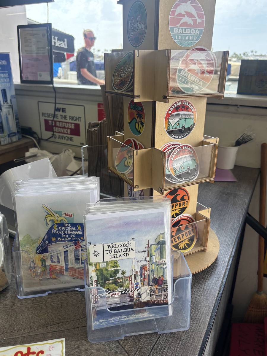 Stickers, magnets and Balboa Island prints at the counter